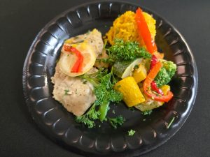 Individual Lemon Pepper Chicken With Yellow Mexican Rice and Veggies